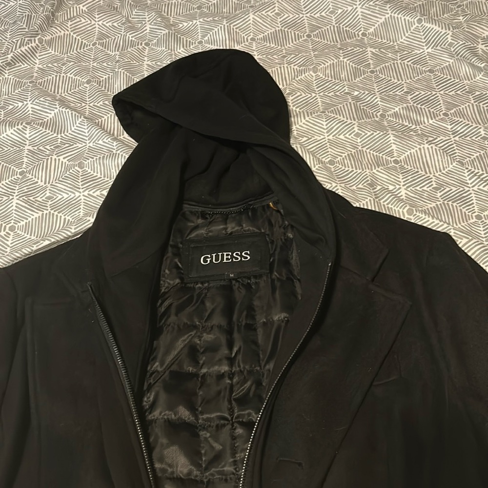 Selling a Guess polyester coat